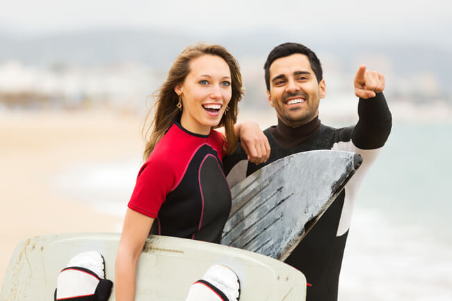 couple with surf boards