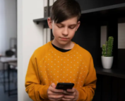 Teen looking at phone